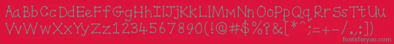 Fonte Spottydottie – fontes cinzas em um fundo vermelho