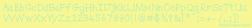 Spottydottie Font – Green Fonts on Yellow Background