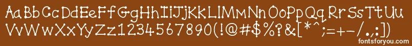 フォントSpottydottie – 茶色の背景に白い文字