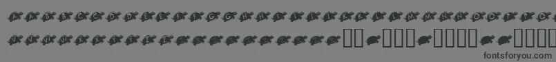 KrJuliesTurtleRescue-Schriftart – Schwarze Schriften auf grauem Hintergrund