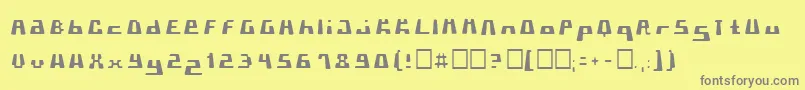 フォントPormaskklmd – 黄色の背景に灰色の文字