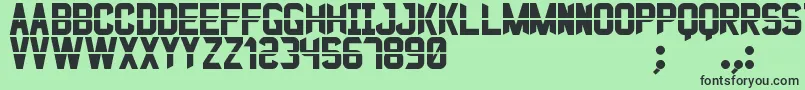 JustoSt-fontti – mustat fontit vihreällä taustalla