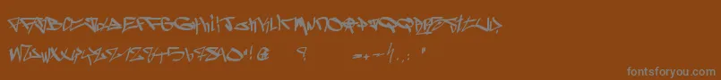 フォントGhettoBlasterz – 茶色の背景に灰色の文字