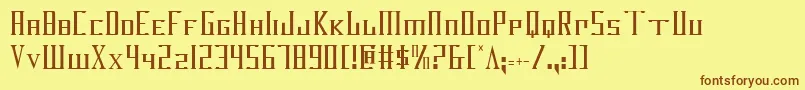 フォントDarkwindCondensed – 茶色の文字が黄色の背景にあります。