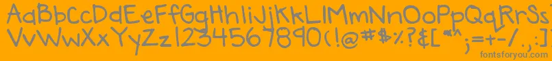 DjbAnnaliseTheBold-Schriftart – Graue Schriften auf orangefarbenem Hintergrund