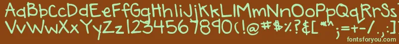 フォントDjbAnnaliseTheBold – 緑色の文字が茶色の背景にあります。
