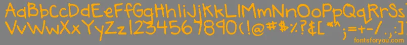 フォントDjbAnnaliseTheBold – オレンジの文字は灰色の背景にあります。