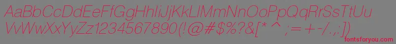 Fonte HeliosthinItalic – fontes vermelhas em um fundo cinza