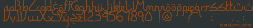 SitiMaesaroh Font – Brown Fonts on Black Background