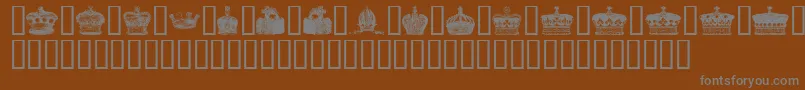 Crowns-fontti – harmaat kirjasimet ruskealla taustalla
