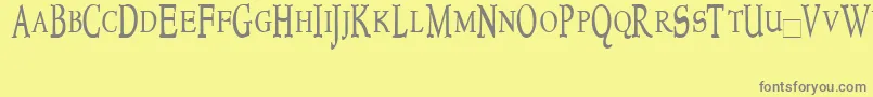 Шрифт Newstyletitlingcondensed – серые шрифты на жёлтом фоне