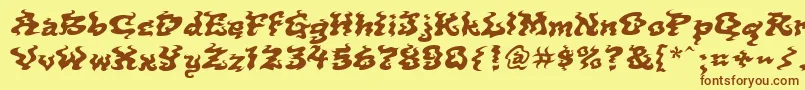 フォントIncense – 茶色の文字が黄色の背景にあります。