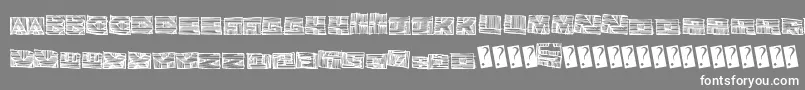 Woodblockcutter-Schriftart – Weiße Schriften auf grauem Hintergrund