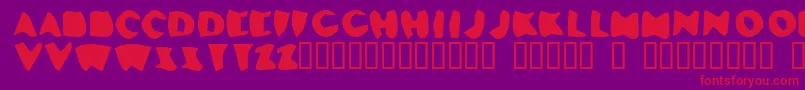 フォントLosDelQueso – 紫の背景に赤い文字