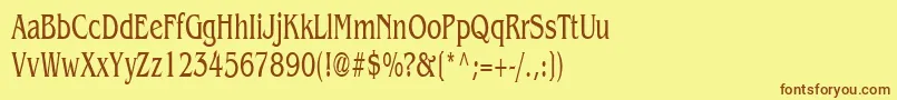 フォントBenguiat65nNormal – 茶色の文字が黄色の背景にあります。