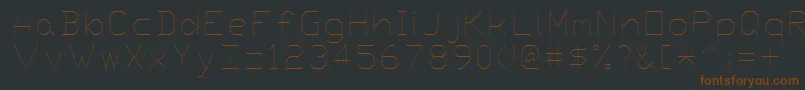 Proxy4-fontti – ruskeat fontit mustalla taustalla