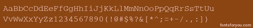 Fonte PcCharsetRegular – fontes rosa em um fundo marrom