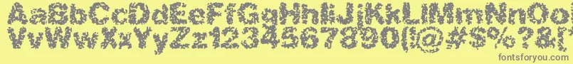 Aspasticフォントについての詳細 フォントAspastic – 黄色の背景に灰色の文字