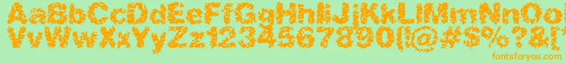 Aspastic Font – Orange Fonts on Green Background