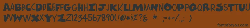 Comicscartoon Font – Black Fonts on Brown Background