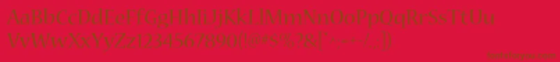 Fonte NuevastdRegular – fontes marrons em um fundo vermelho