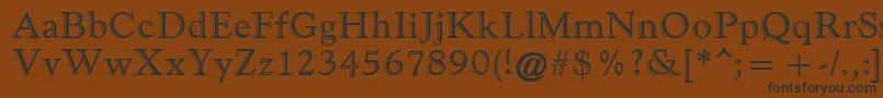 GoudyHandtooledAtt Font – Black Fonts on Brown Background