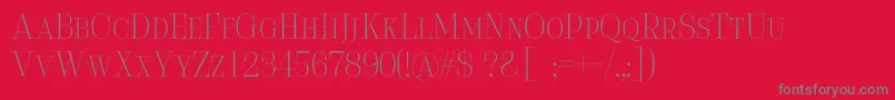 フォントSerifiqo4fFreeCapitals – 赤い背景に灰色の文字