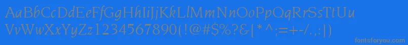 ItcNovareseLtBookItalic-Schriftart – Graue Schriften auf blauem Hintergrund