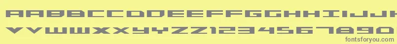 Triremebold-Schriftart – Graue Schriften auf gelbem Hintergrund