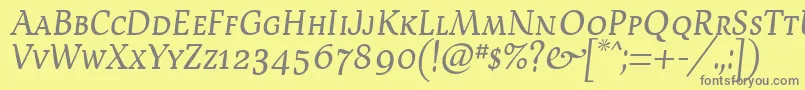 フォントDevroysc – 黄色の背景に灰色の文字