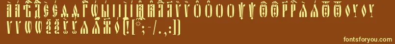 OglavieUcsSpacedout Font – Yellow Fonts on Brown Background