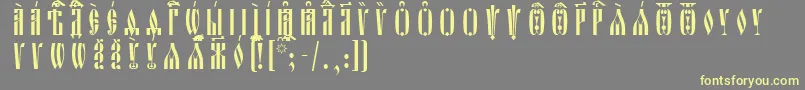 OglavieUcsSpacedout Font – Yellow Fonts on Gray Background