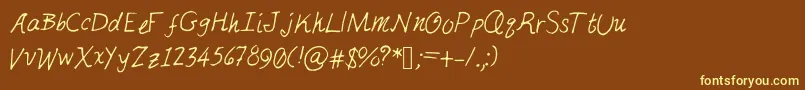 Justmai-fontti – keltaiset fontit ruskealla taustalla