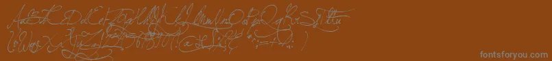 Шрифт JellykaBeesAntiqueHandwriting – серые шрифты на коричневом фоне