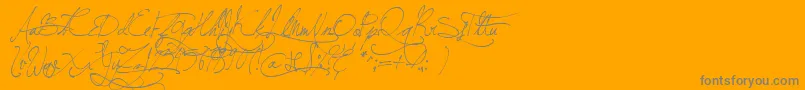 fuente JellykaBeesAntiqueHandwriting – Fuentes Grises Sobre Fondo Naranja