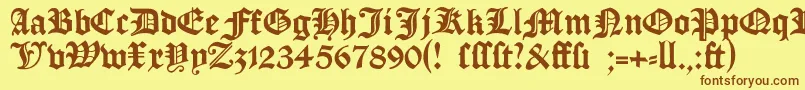 フォントManuskriptgotisch – 茶色の文字が黄色の背景にあります。