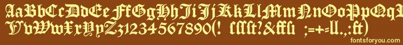 Manuskriptgotisch-fontti – keltaiset fontit ruskealla taustalla
