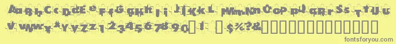 PuzzlePieces-Schriftart – Graue Schriften auf gelbem Hintergrund