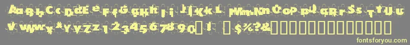 PuzzlePieces Font – Yellow Fonts on Gray Background