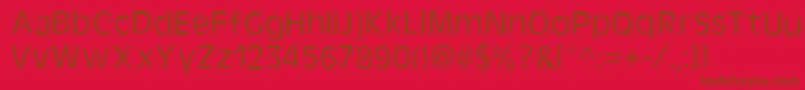 Police Kate – polices brunes sur fond rouge