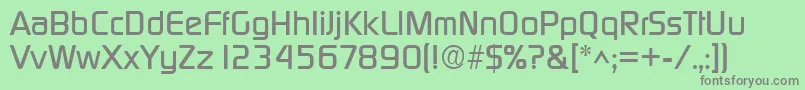 DigitalRegular-fontti – harmaat kirjasimet vihreällä taustalla