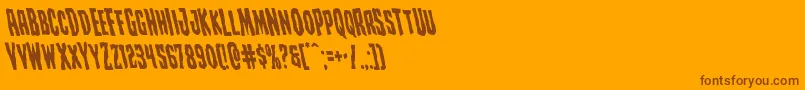 Czcionka Creepycrawlersleft – brązowe czcionki na pomarańczowym tle