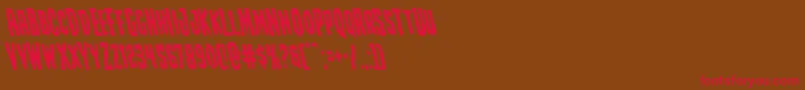 Creepycrawlersleft-Schriftart – Rote Schriften auf braunem Hintergrund