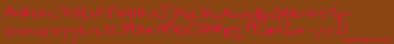 LucyGooseyBlackLoose Font – Red Fonts on Brown Background