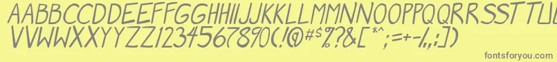 MangaSpeak2Italic-fontti – harmaat kirjasimet keltaisella taustalla