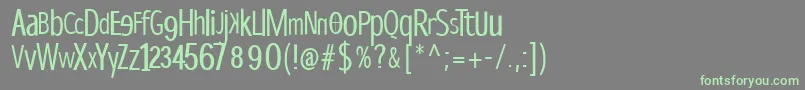 フォントDispropsans – 灰色の背景に緑のフォント