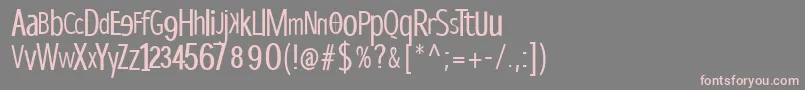 フォントDispropsans – 灰色の背景にピンクのフォント