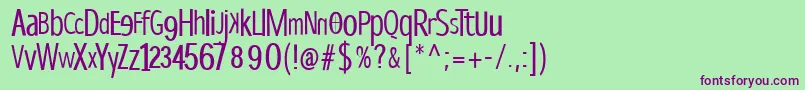 フォントDispropsans – 緑の背景に紫のフォント
