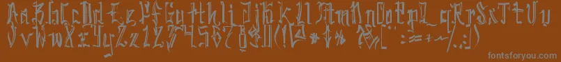 SickcapitalKingston-fontti – harmaat kirjasimet ruskealla taustalla