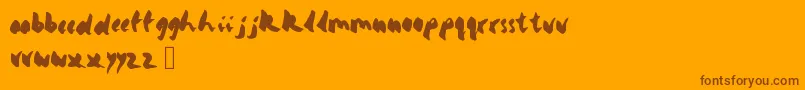 Yello-Schriftart – Braune Schriften auf orangefarbenem Hintergrund